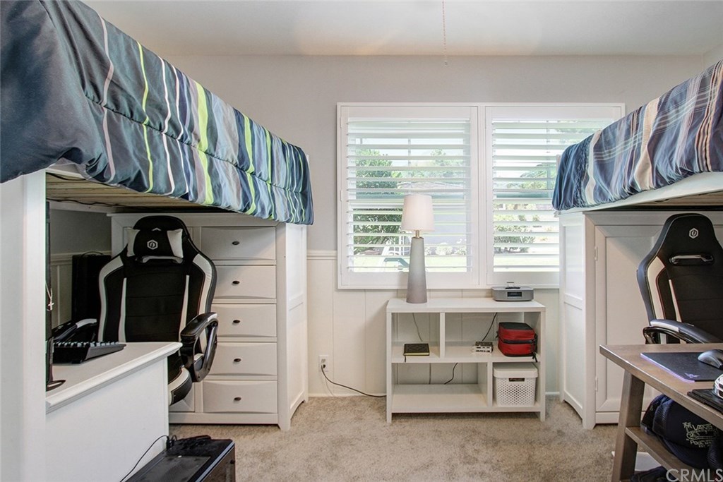 3745 Landfair Road Pasadena, CA 91107 - Photo 19 of 25 a view of walk in closet with clothes and shoes