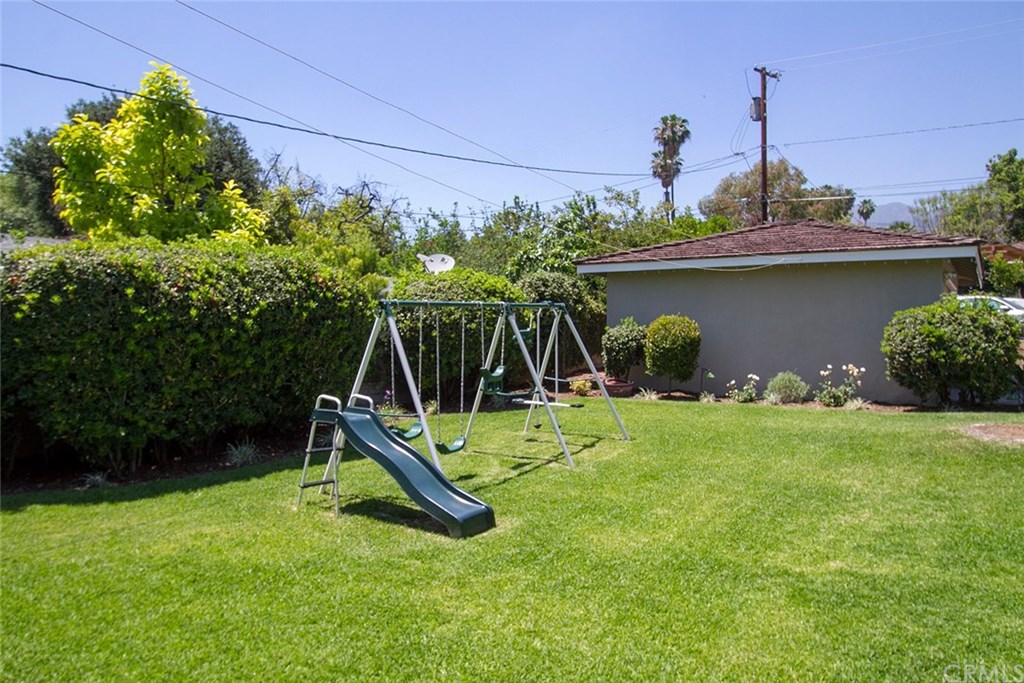 3745 Landfair Road Pasadena, CA 91107 - Photo 22 of 25 a backyard of a house with table and chairs
