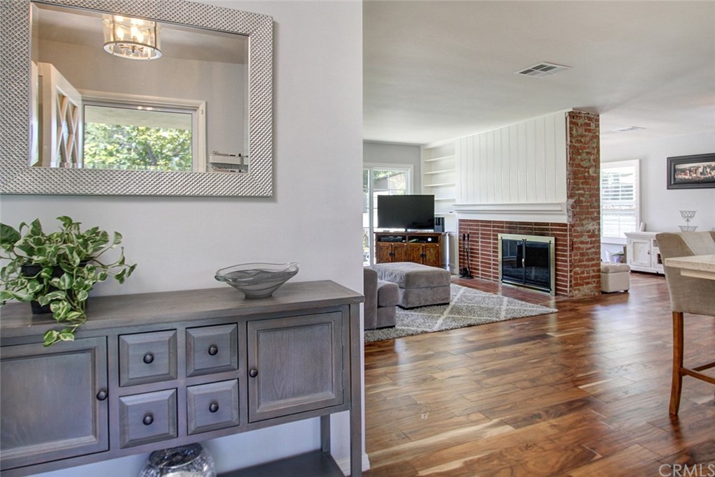 3745 Landfair Road Pasadena, CA 91107 - Photo 5 of 25 a living room with furniture and a fireplace