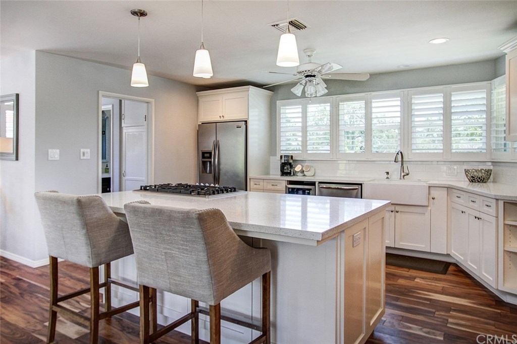 3745 Landfair Road Pasadena, CA 91107 - Photo 7 of 25 a kitchen with granite countertop a sink stove and cabinets