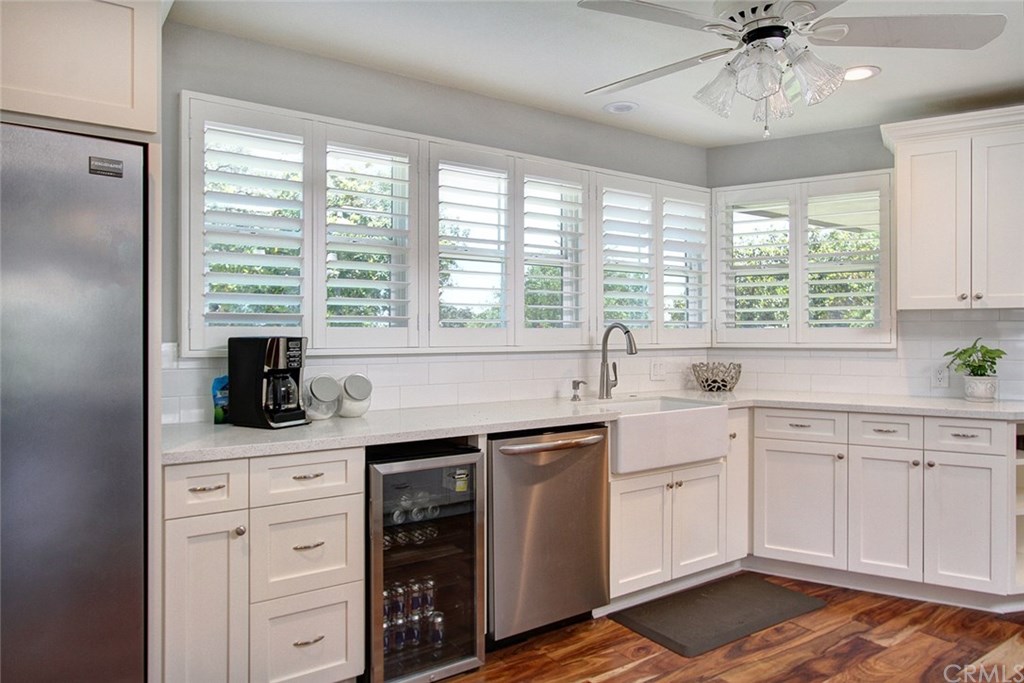 3745 Landfair Road Pasadena, CA 91107 - Photo 8 of 25 a kitchen with a sink stove and cabinets