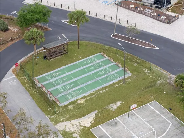 a aerial view of a house with outdoor space