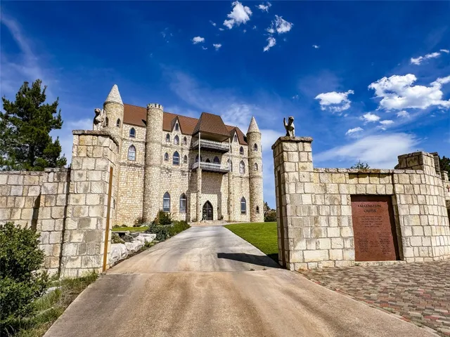 a view of a building with a street