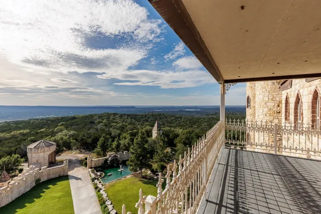 a view of a lake with a building in the background