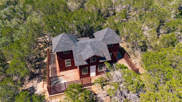 a house view with a backyard space