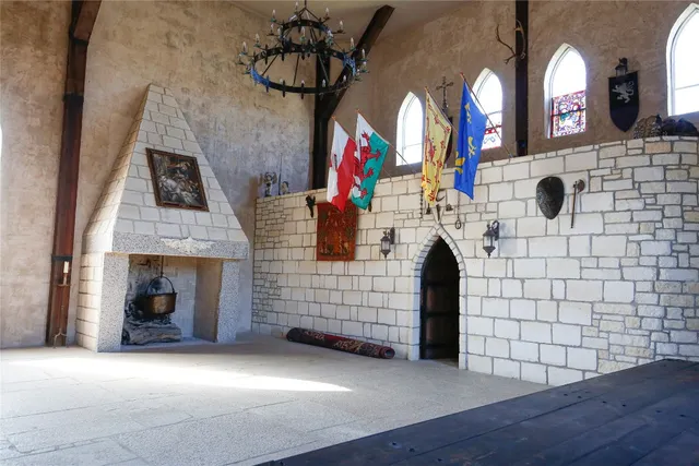 a view of livingroom with fireplace and window