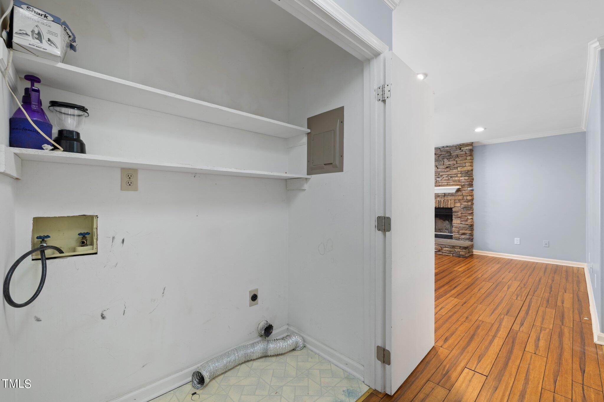 4209 Timberbrook Drive Raleigh, NC 27616 - Photo 17 of 39 a view of a storage & utility room with wooden floor
