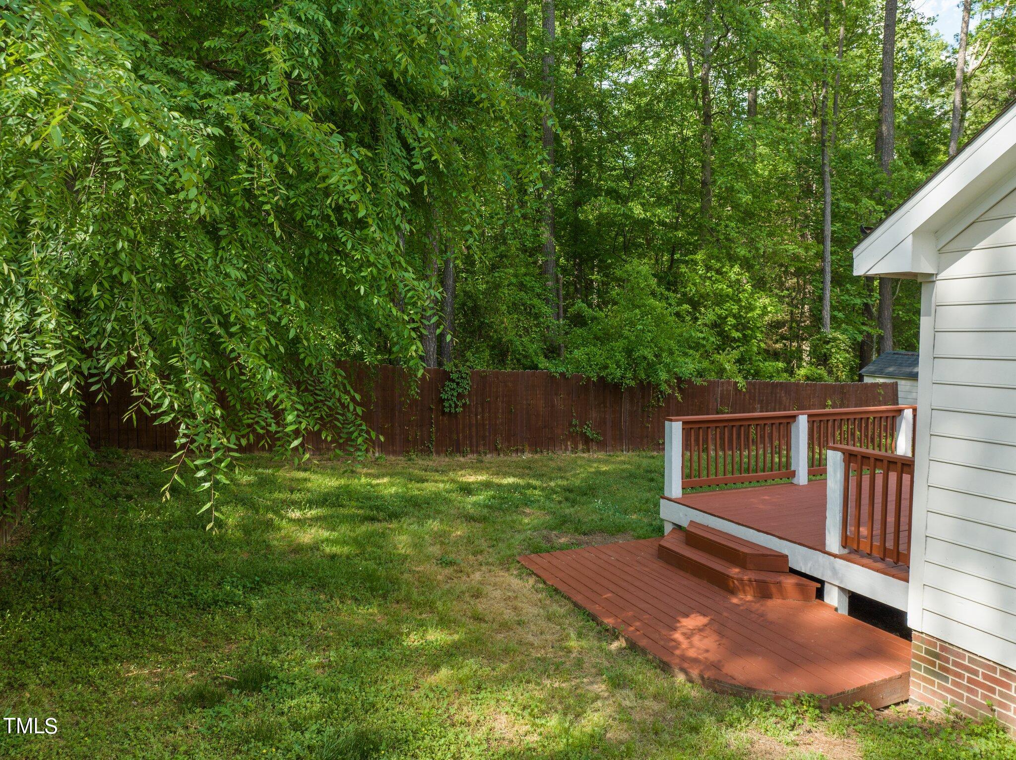 4209 Timberbrook Drive Raleigh, NC 27616 - Photo 27 of 39 a view of a backyard with a small cabin