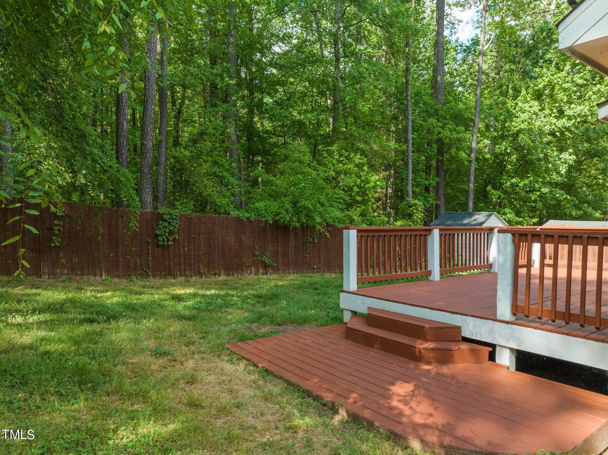 4209 Timberbrook Drive Raleigh, NC 27616 - Photo 28 of 39 a small yard with wooden fence