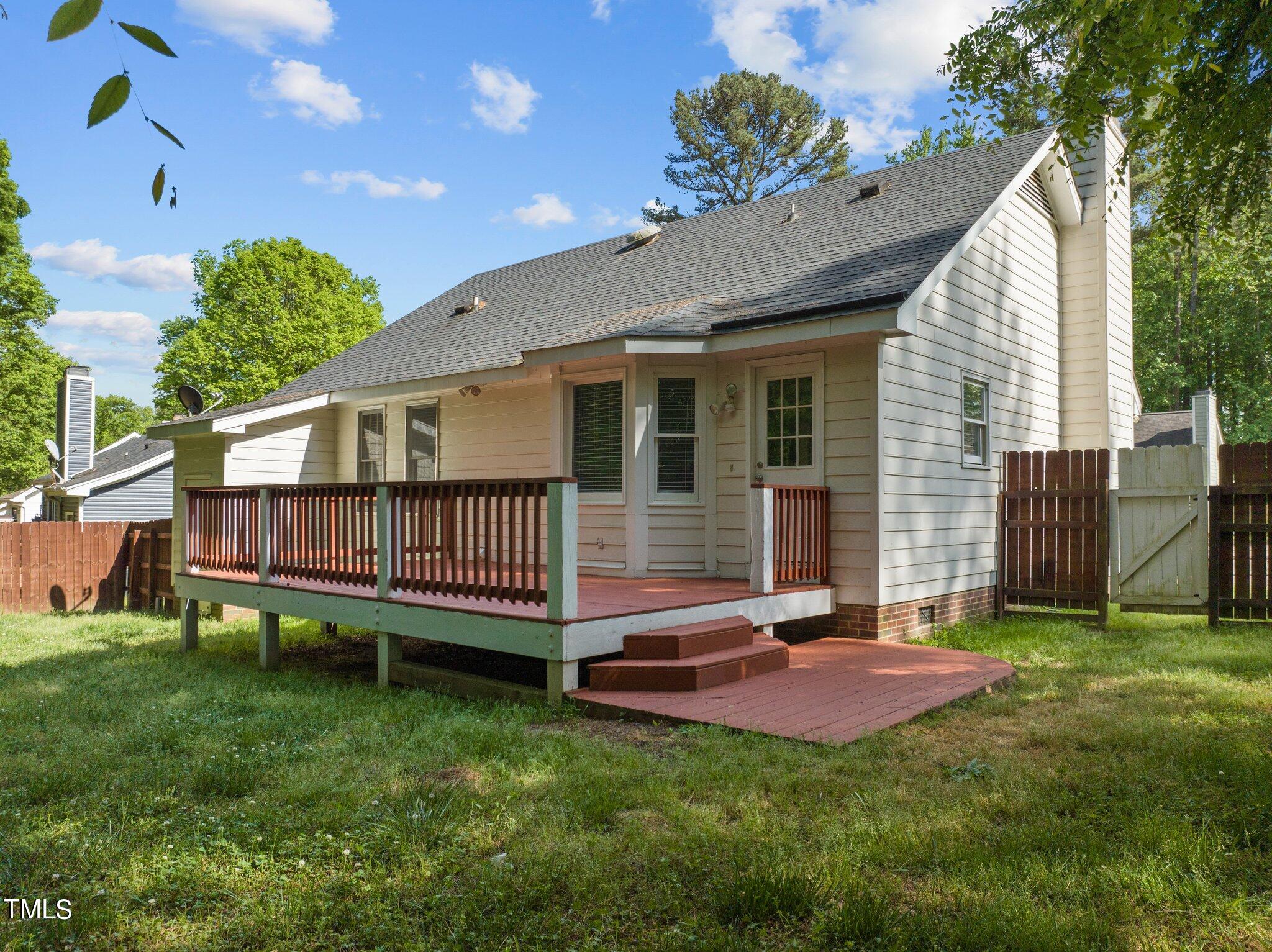 4209 Timberbrook Drive Raleigh, NC 27616 - Photo 29 of 39 a view of backyard with deck and garden