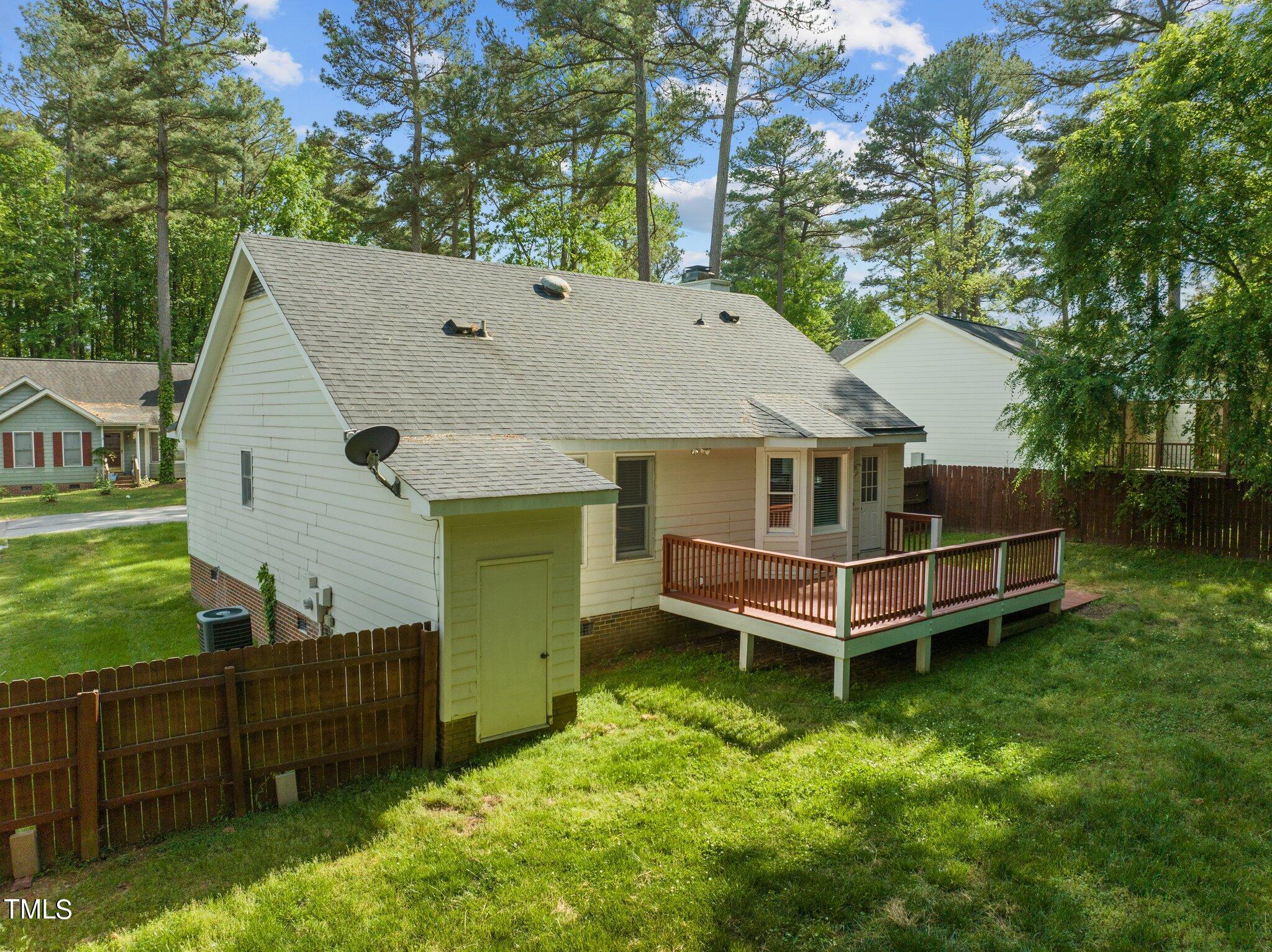 4209 Timberbrook Drive Raleigh, NC 27616 - Photo 32 of 39 a front view of a house with a yard