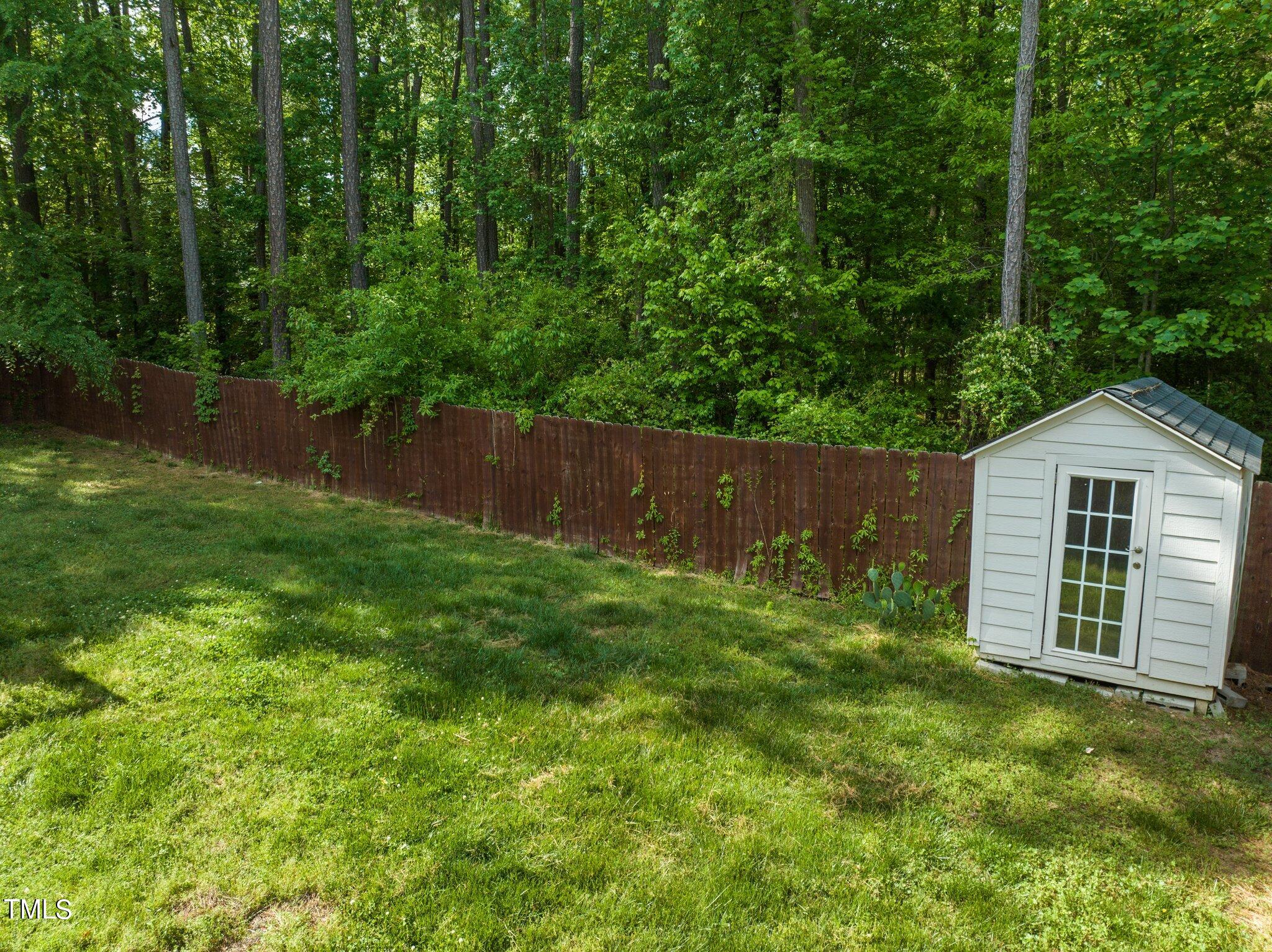 4209 Timberbrook Drive Raleigh, NC 27616 - Photo 35 of 39 a view of a house with a yard