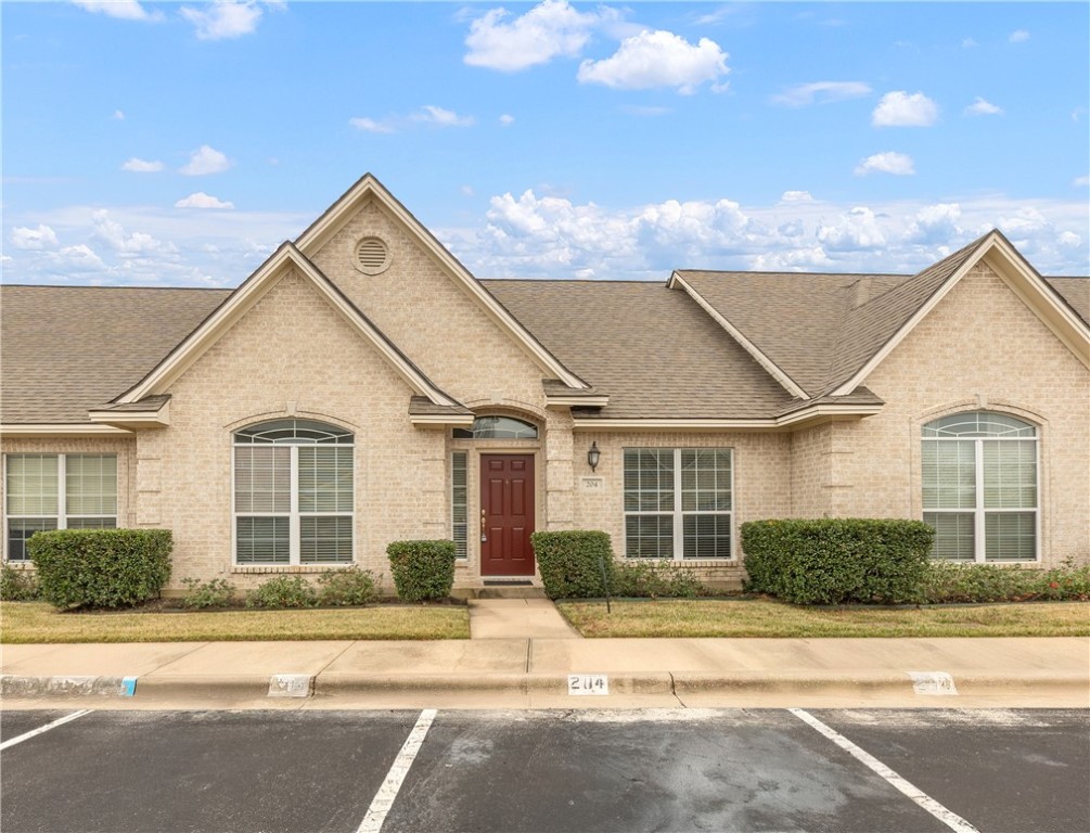 204 Fraternity Row College Station, TX 77845 - Photo 1 of 21 front view of a house and a yard