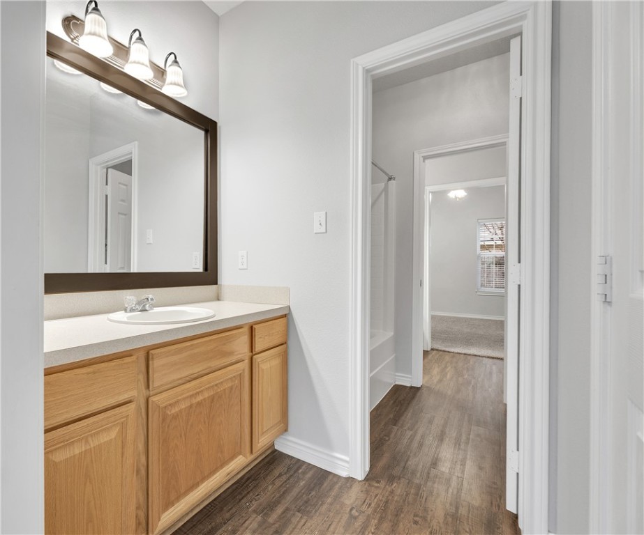204 Fraternity Row College Station, TX 77845 - Photo 16 of 21 a bathroom with a sink and a mirror