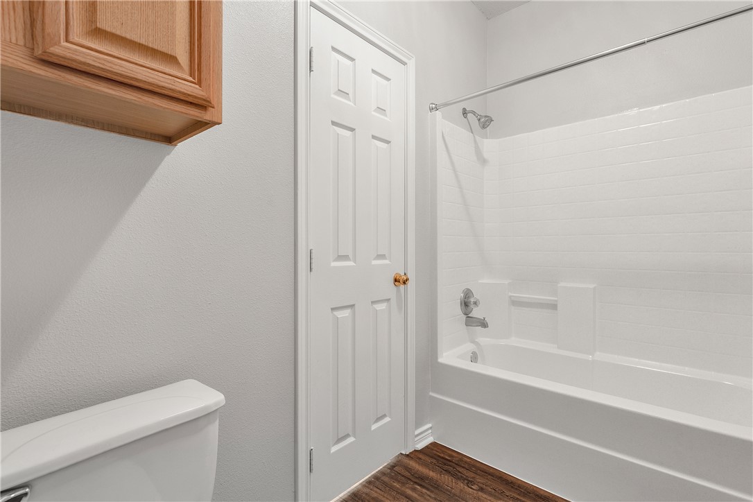 204 Fraternity Row College Station, TX 77845 - Photo 17 of 21 a bathroom with a shower and a toilet