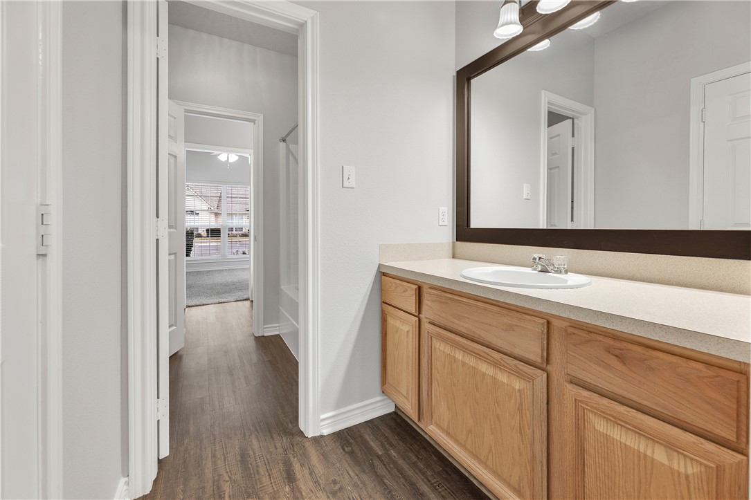 204 Fraternity Row College Station, TX 77845 - Photo 18 of 21 a bathroom with a sink and a mirror