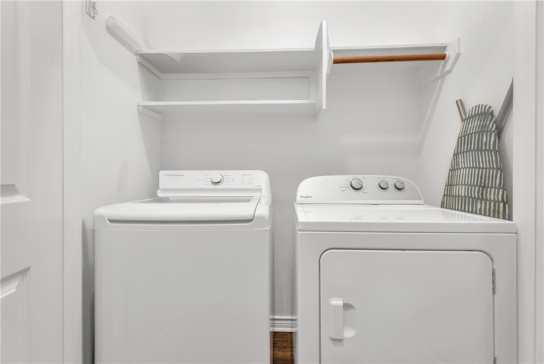 204 Fraternity Row College Station, TX 77845 - Photo 20 of 21 a utility room with dryer and washer