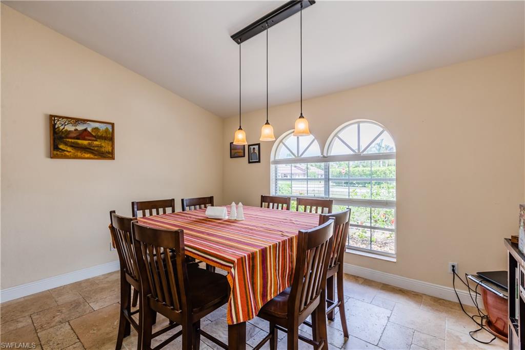 102 Cedar Crest Court Naples, FL 34113 - Photo 6 of 15 a view of a dining room with furniture window and outside view