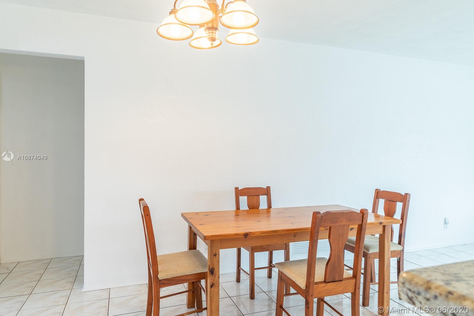 5416 Jefferson Street Hollywood, FL 33021 - Photo 18 of 70 a view of a dining room with furniture