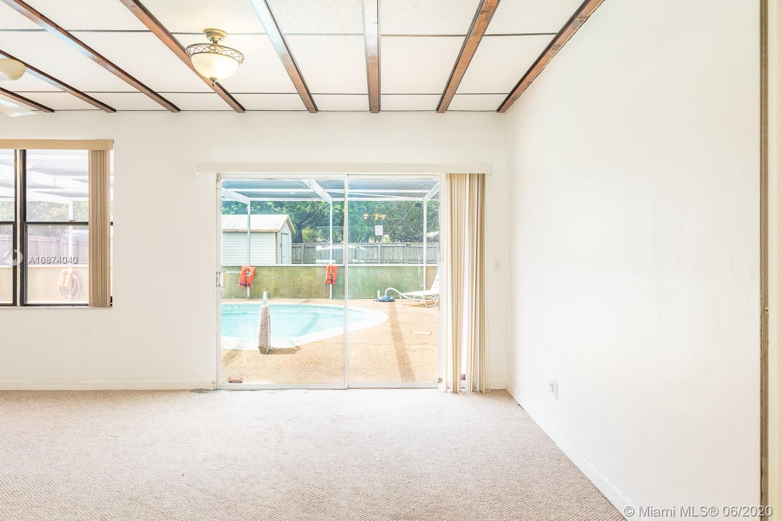 5416 Jefferson Street Hollywood, FL 33021 - Photo 21 of 70 a view of a room with a large window