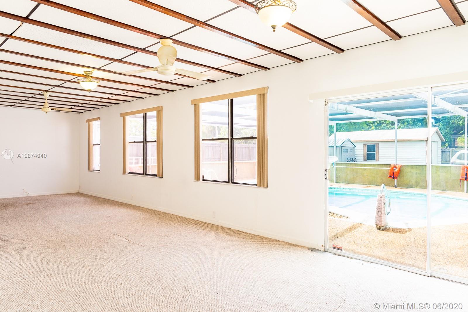 5416 Jefferson Street Hollywood, FL 33021 - Photo 22 of 70 a view of an empty room with a window