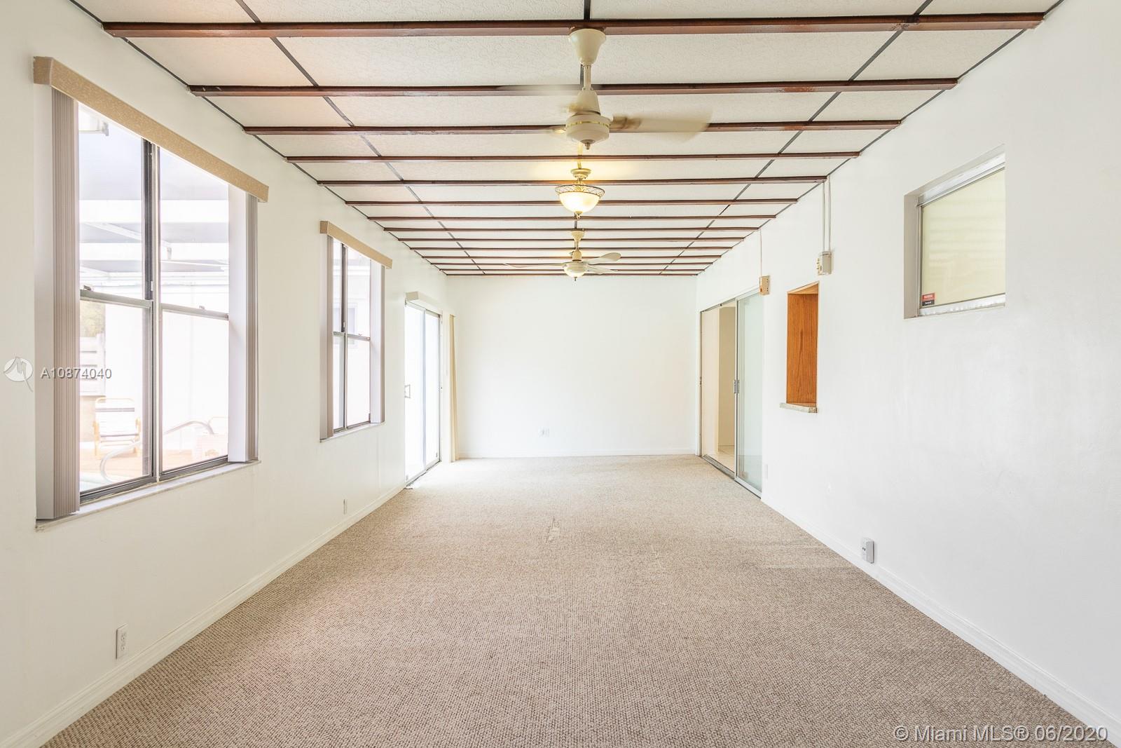 5416 Jefferson Street Hollywood, FL 33021 - Photo 24 of 70 a view of empty room with windows