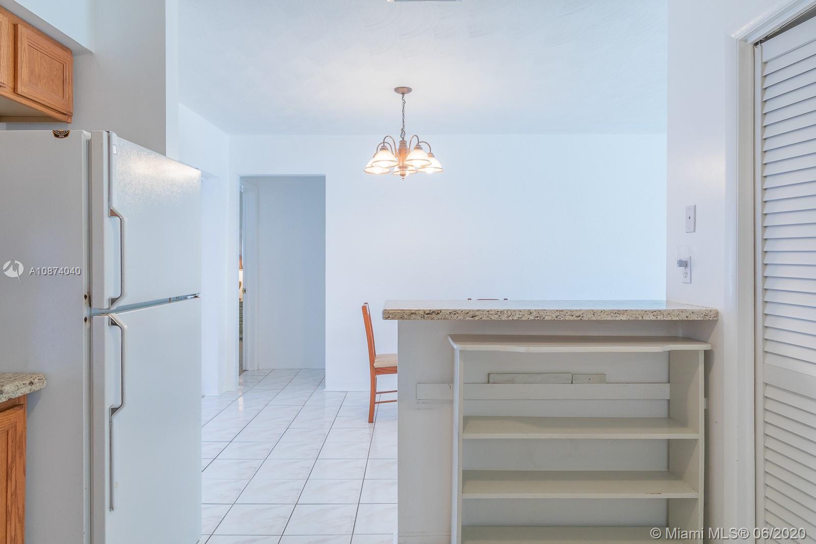 5416 Jefferson Street Hollywood, FL 33021 - Photo 32 of 70 a view of a hallway with closet area
