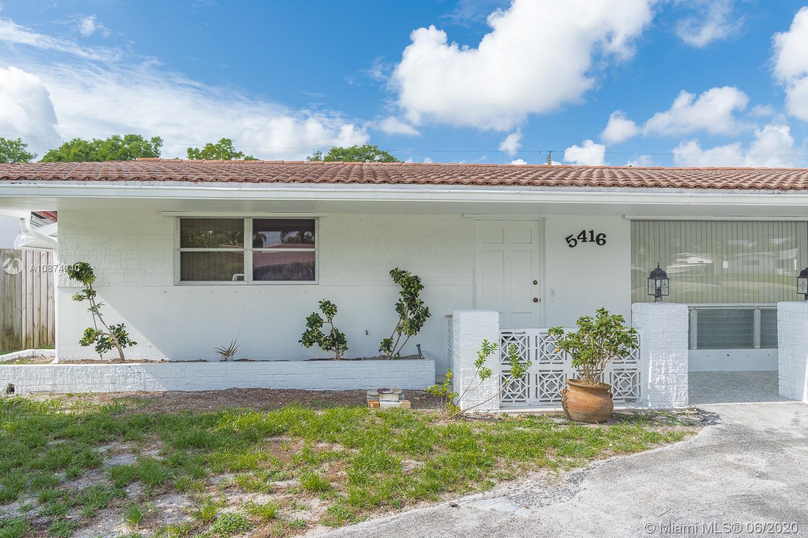 5416 Jefferson Street Hollywood, FL 33021 - Photo 4 of 70 a view of a house with a outdoor space