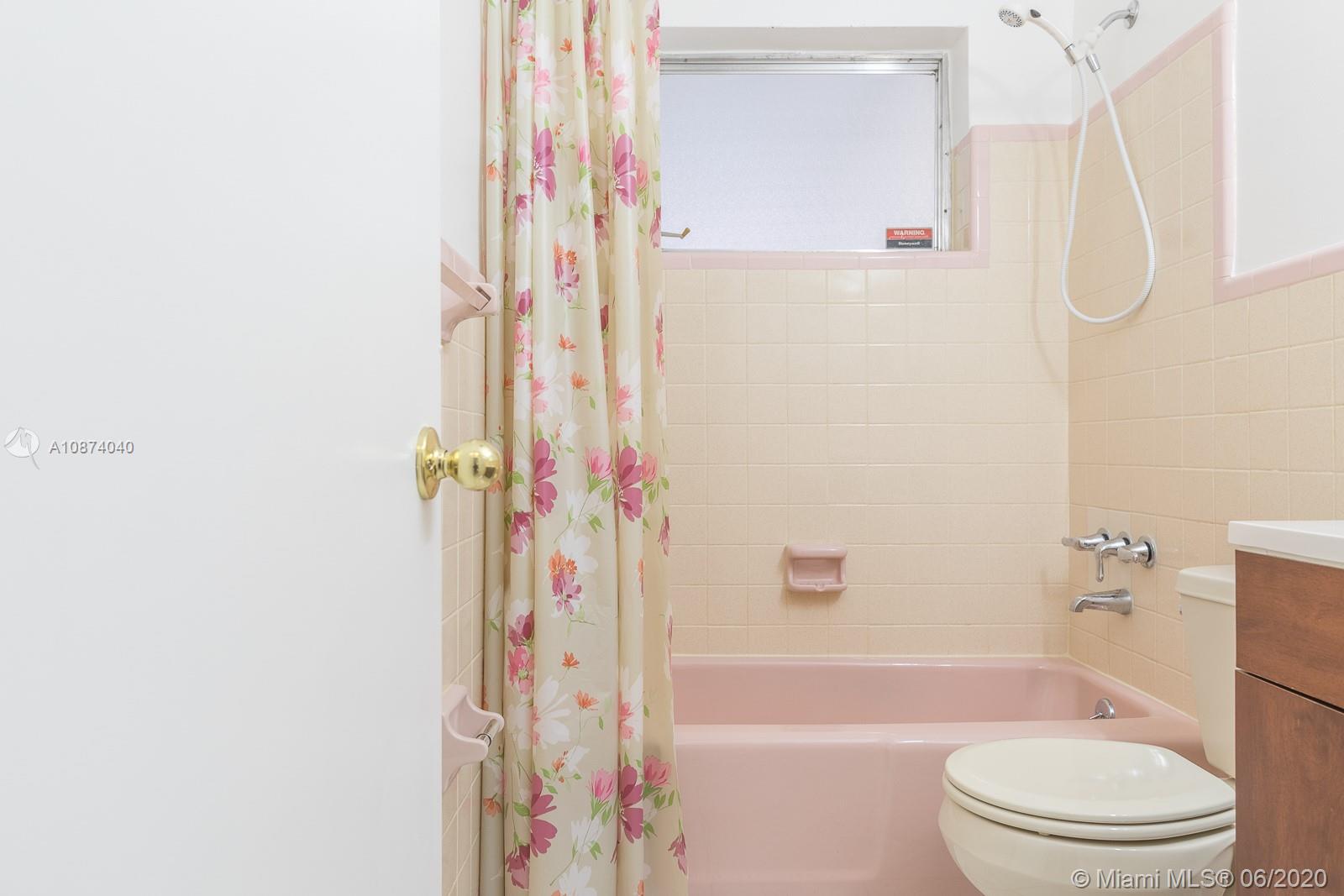5416 Jefferson Street Hollywood, FL 33021 - Photo 41 of 70 a bathroom with a toilet and a shower