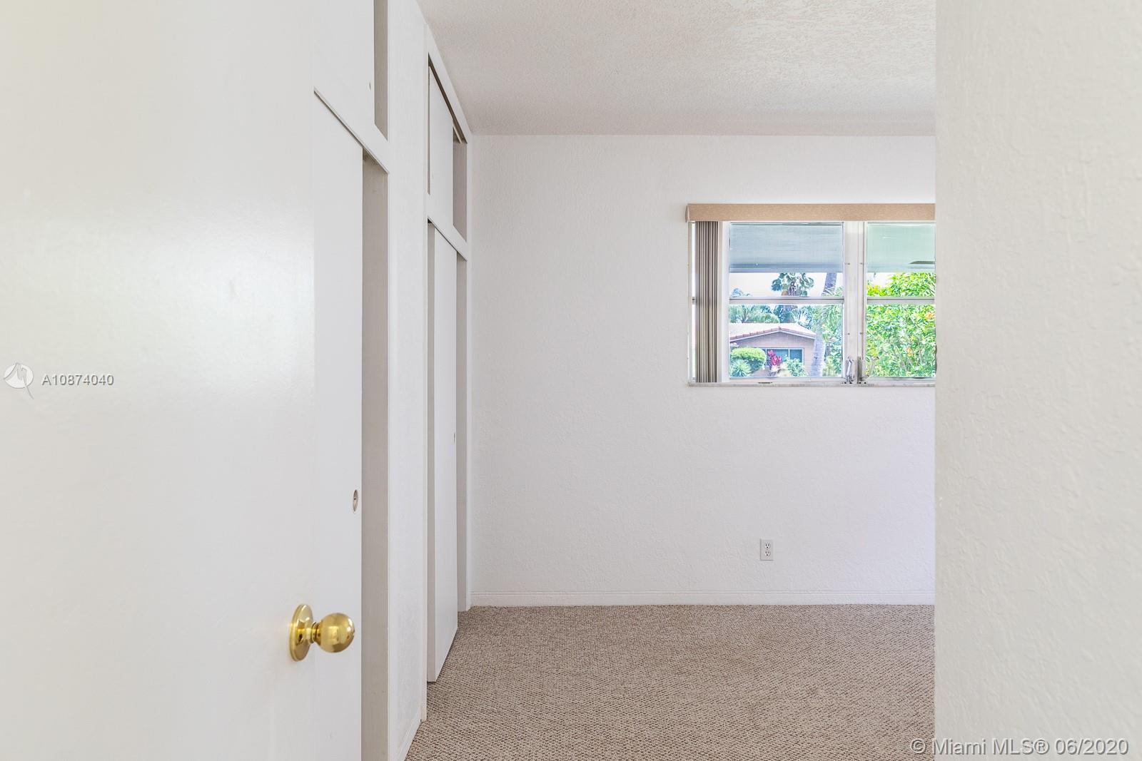 5416 Jefferson Street Hollywood, FL 33021 - Photo 45 of 70 an empty room with windows
