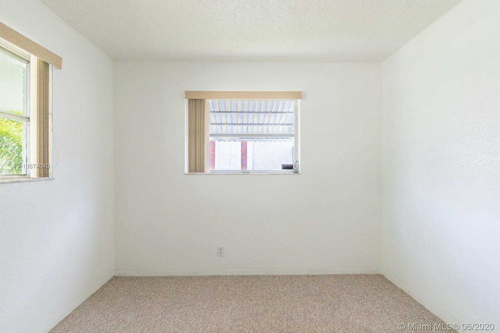 5416 Jefferson Street Hollywood, FL 33021 - Photo 47 of 70 an empty room with a window