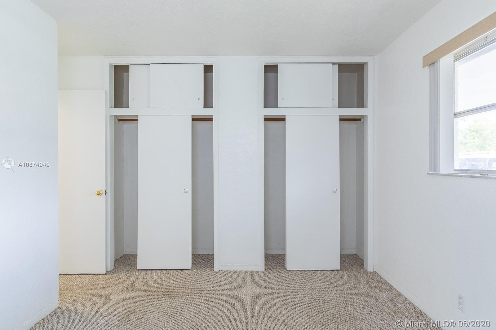 5416 Jefferson Street Hollywood, FL 33021 - Photo 49 of 70 an empty room with windows