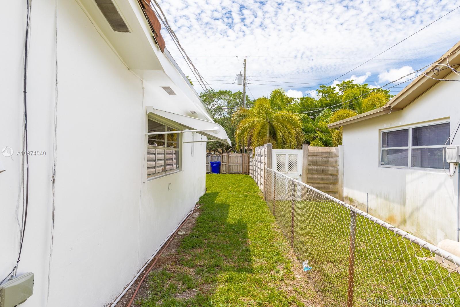 5416 Jefferson Street Hollywood, FL 33021 - Photo 70 of 70 a bathroom with a swimming pool
