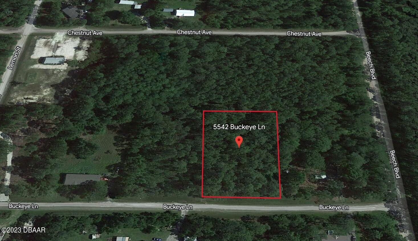 5542 Buckeye Lane Bunnell, FL 32110 - Photo 5 of 8 a sign that is on the side of a building