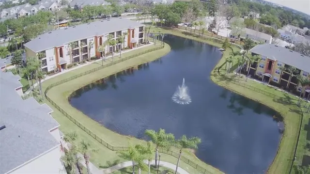 an aerial view of a house with outdoor space