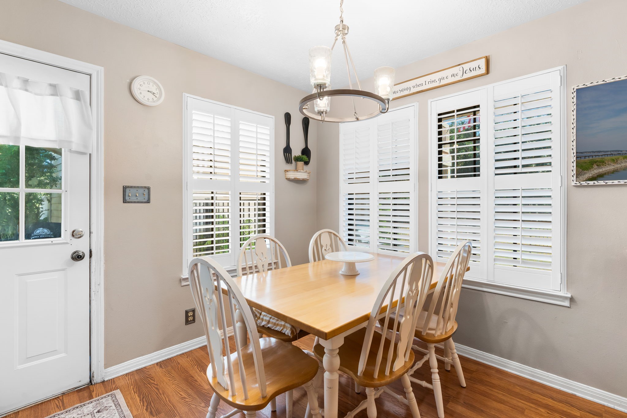 6971 Breezy Point Willis, TX 77318 - Photo 10 of 49 a view of a dining room with furniture window and wooden floor