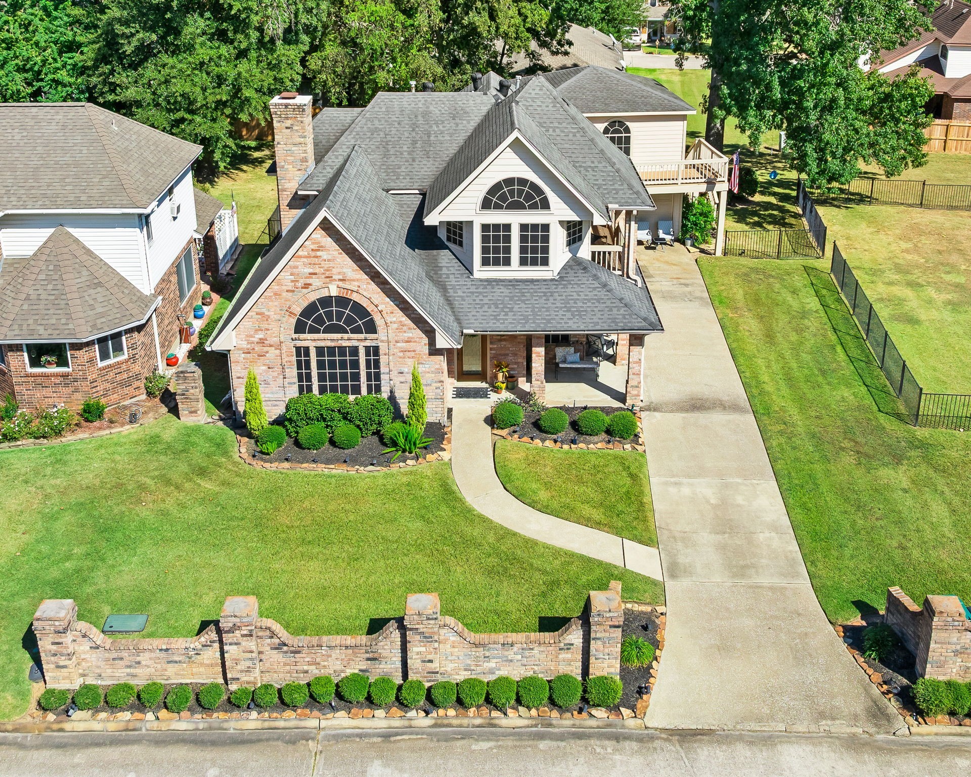 6971 Breezy Point Willis, TX 77318 - Photo 38 of 49 a front view of a house with a yard