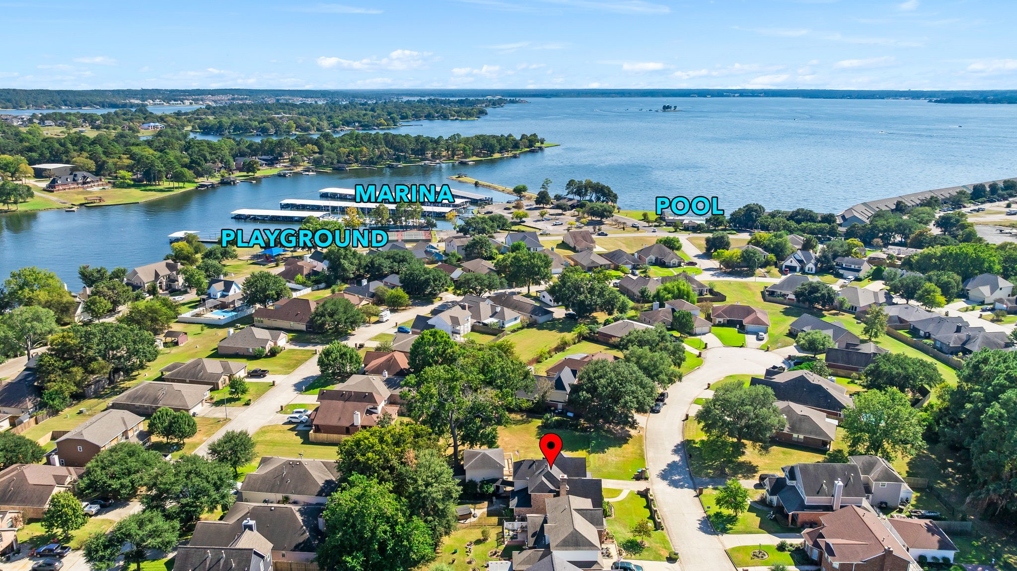 6971 Breezy Point Willis, TX 77318 - Photo 43 of 49 an aerial view of a houses with a lake view