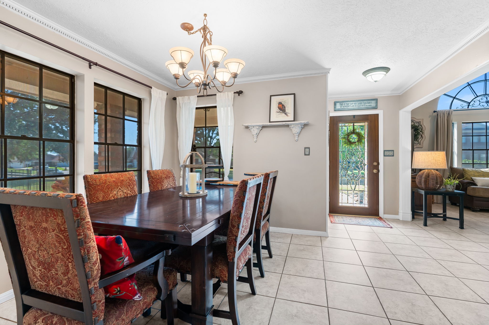 6971 Breezy Point Willis, TX 77318 - Photo 48 of 49 a view of a dining room with furniture and chandelier