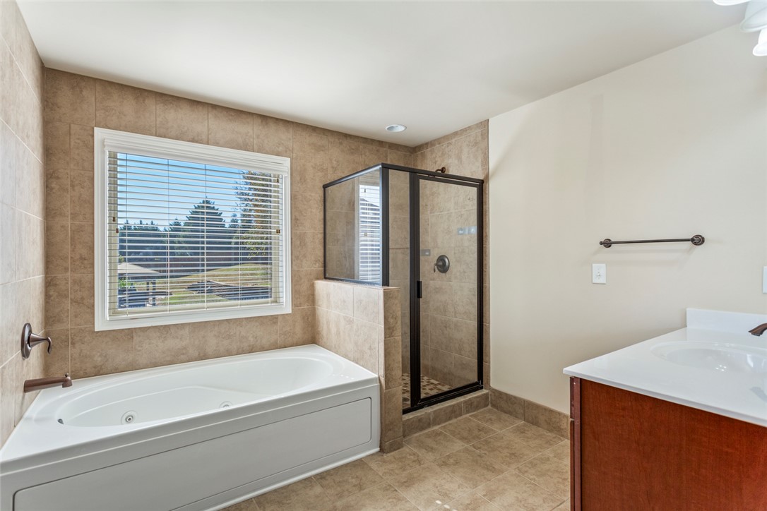 1005 Winmar Drive Anderson, SC 29621 - Photo 32 of 50 This serene bathroom offers a soaking tub, separate shower, and a clean, spacious layout.