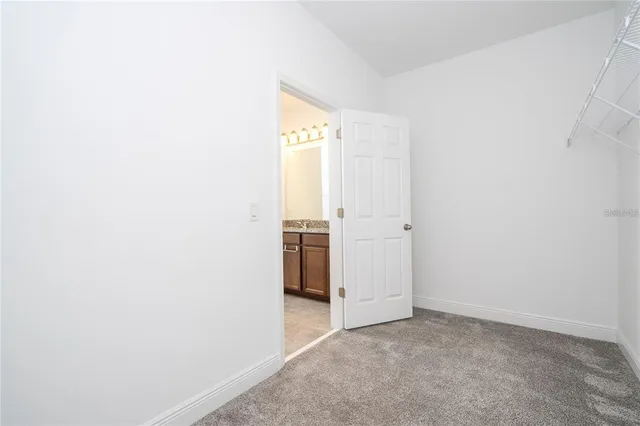 a view of swimming pool with seating area