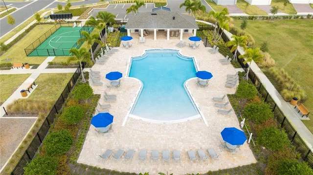 a view of swimming pool with a patio