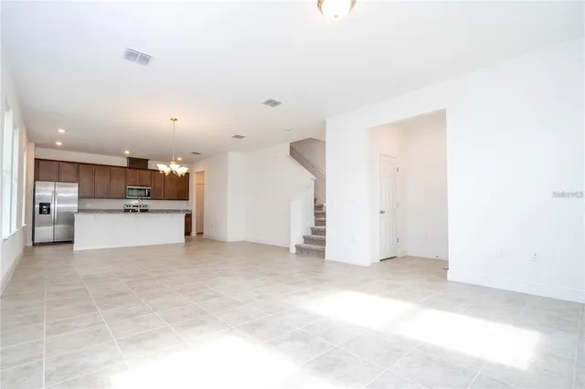 a view of a kitchen with a sink