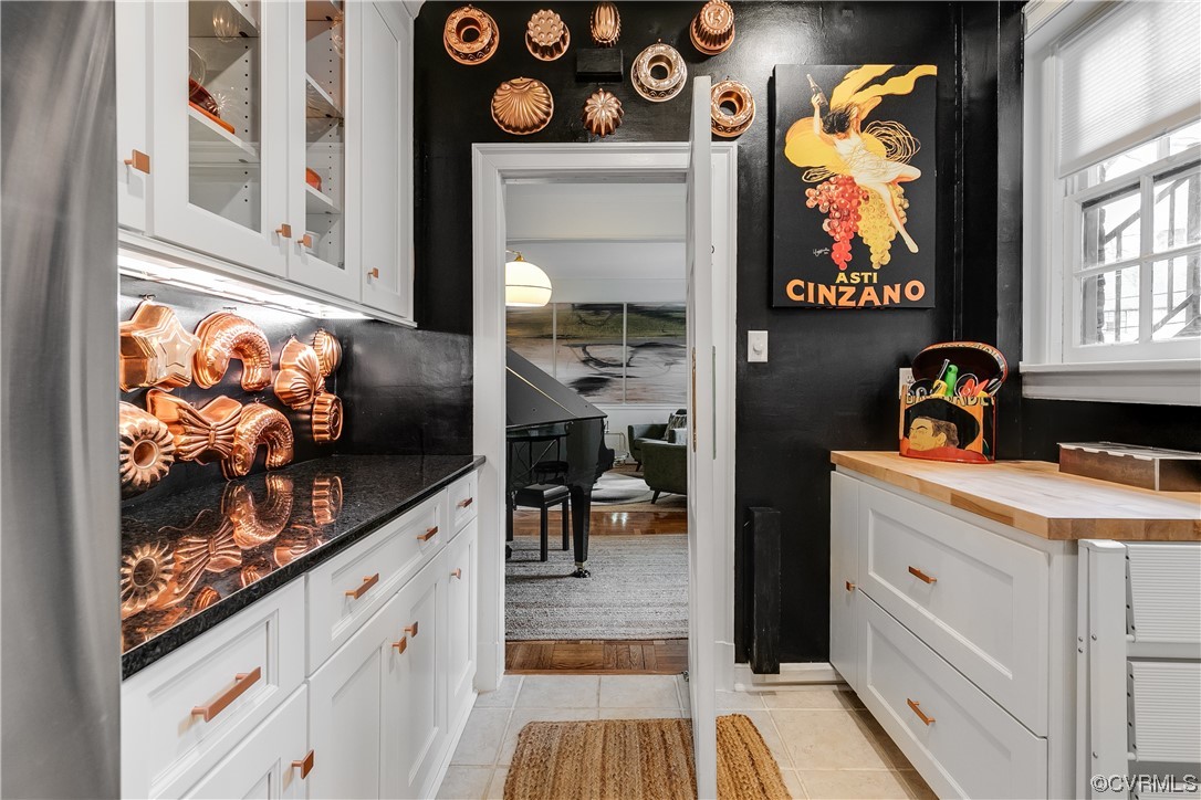 5621 Cary Street Road, Unit U206 Richmond, VA 23226 - Photo 14 of 34 a kitchen with stainless steel appliances granite countertop a stove and a microwave
