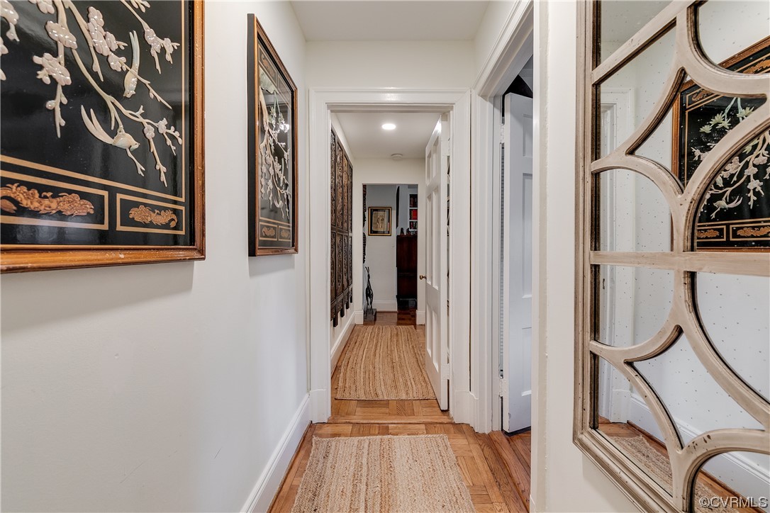 5621 Cary Street Road, Unit U206 Richmond, VA 23226 - Photo 16 of 34 a view of a hallway with wooden floor and staircase
