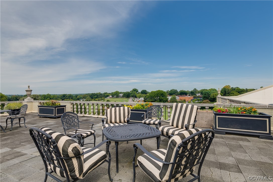 5621 Cary Street Road, Unit U206 Richmond, VA 23226 - Photo 28 of 34 an outdoor view with patio
