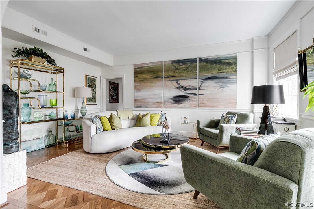 5621 Cary Street Road, Unit U206 Richmond, VA 23226 - Photo 10 of 34 a living room with furniture and a flat screen tv