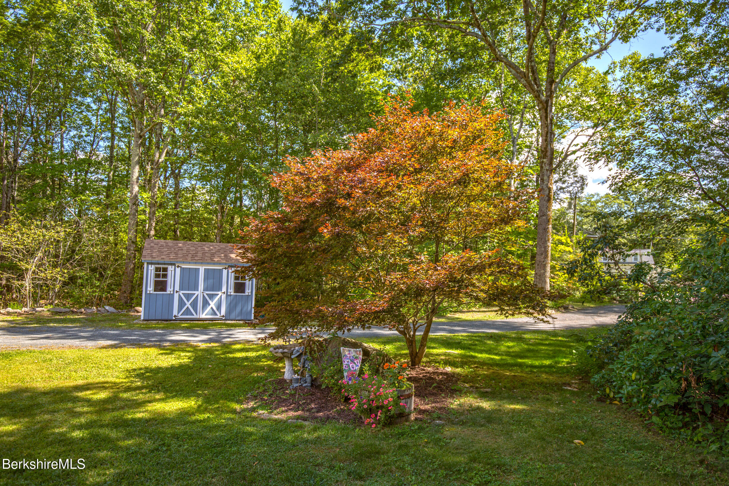 590 Colebrook River Road Tolland, MA 01034 - Photo 54 of 54 a view of a house with a yard
