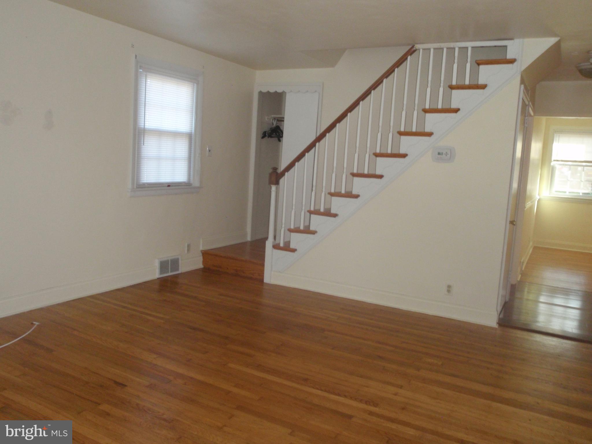 100 Moore Road Wallingford, PA 19086 - Photo 3 of 14 Living room with stairs to 2nd floor