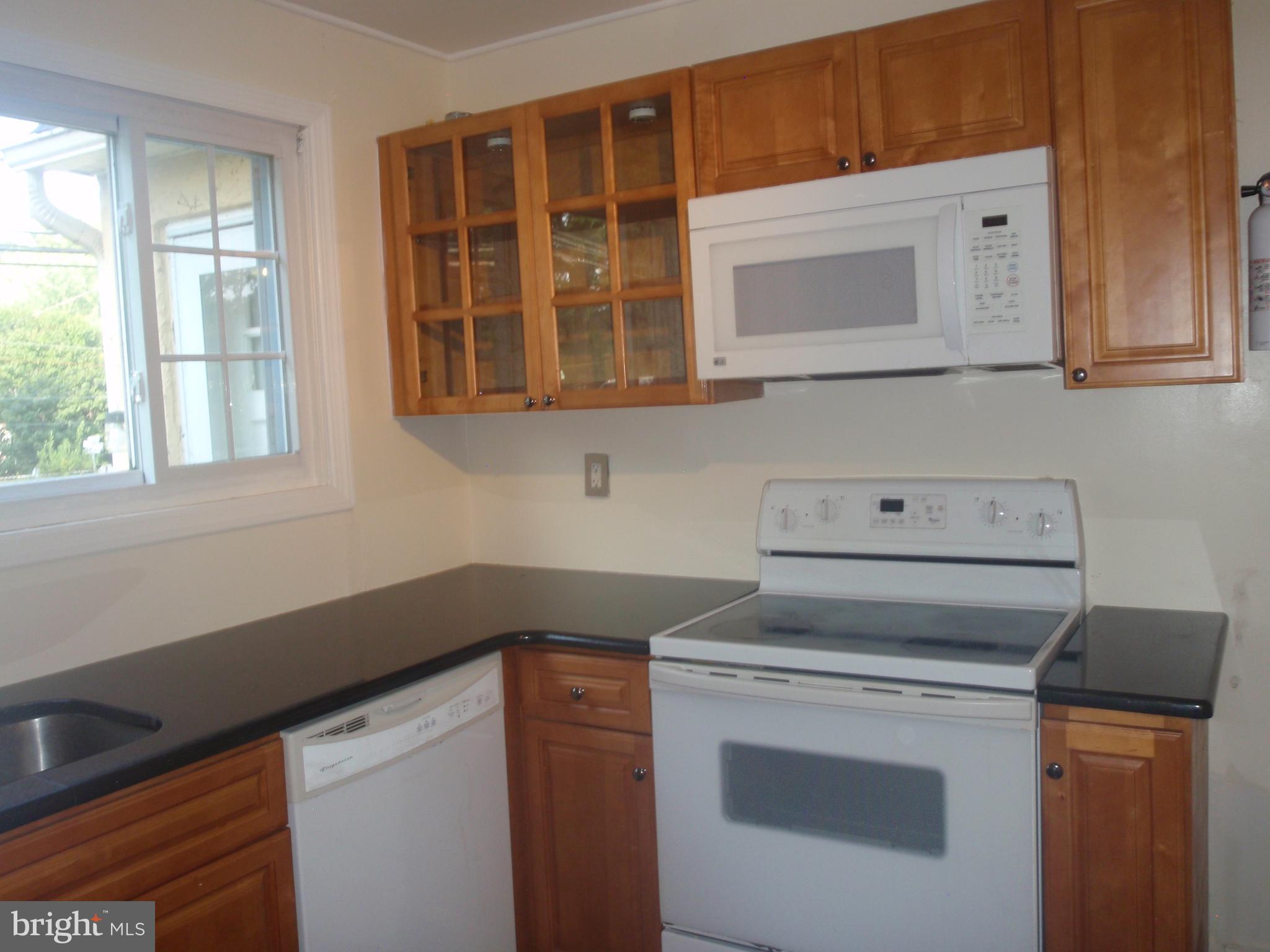 100 Moore Road Wallingford, PA 19086 - Photo 4 of 14 Updated kitchen w/granite counter top